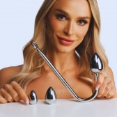 Crochet anal training - les oeufs se vissent sur le crochet anal